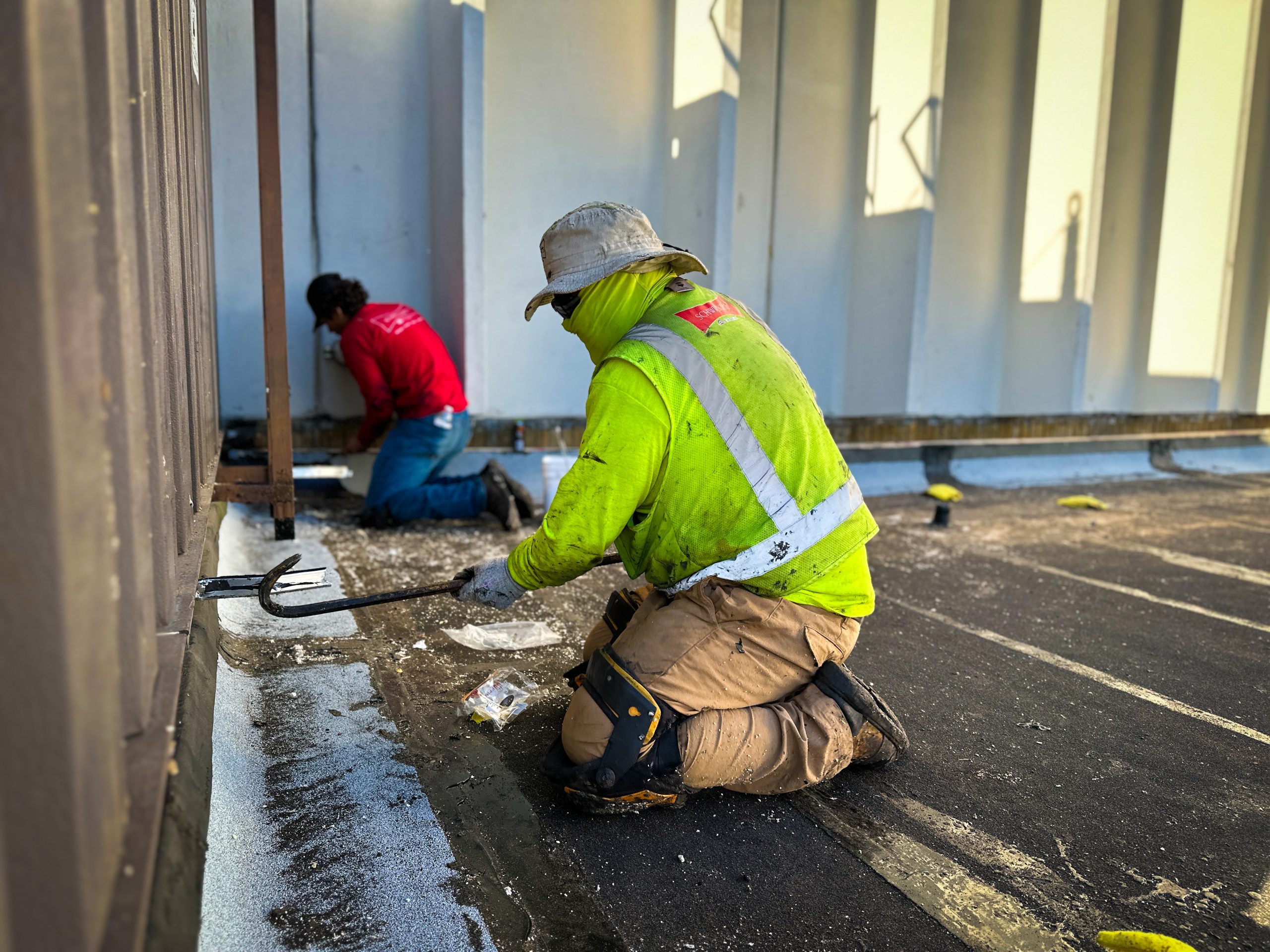 construction worker prepping for a reroof