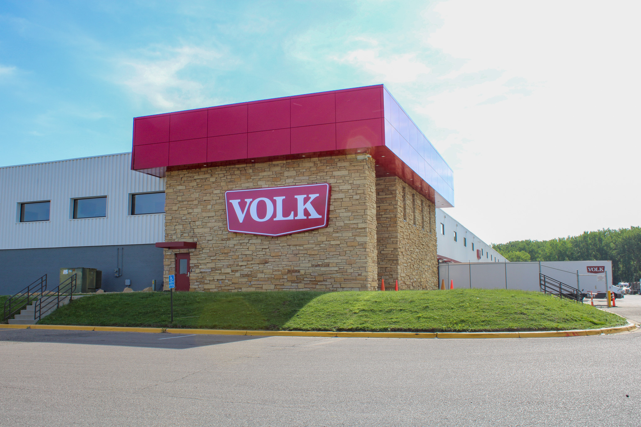 office building featuring red ACM panels