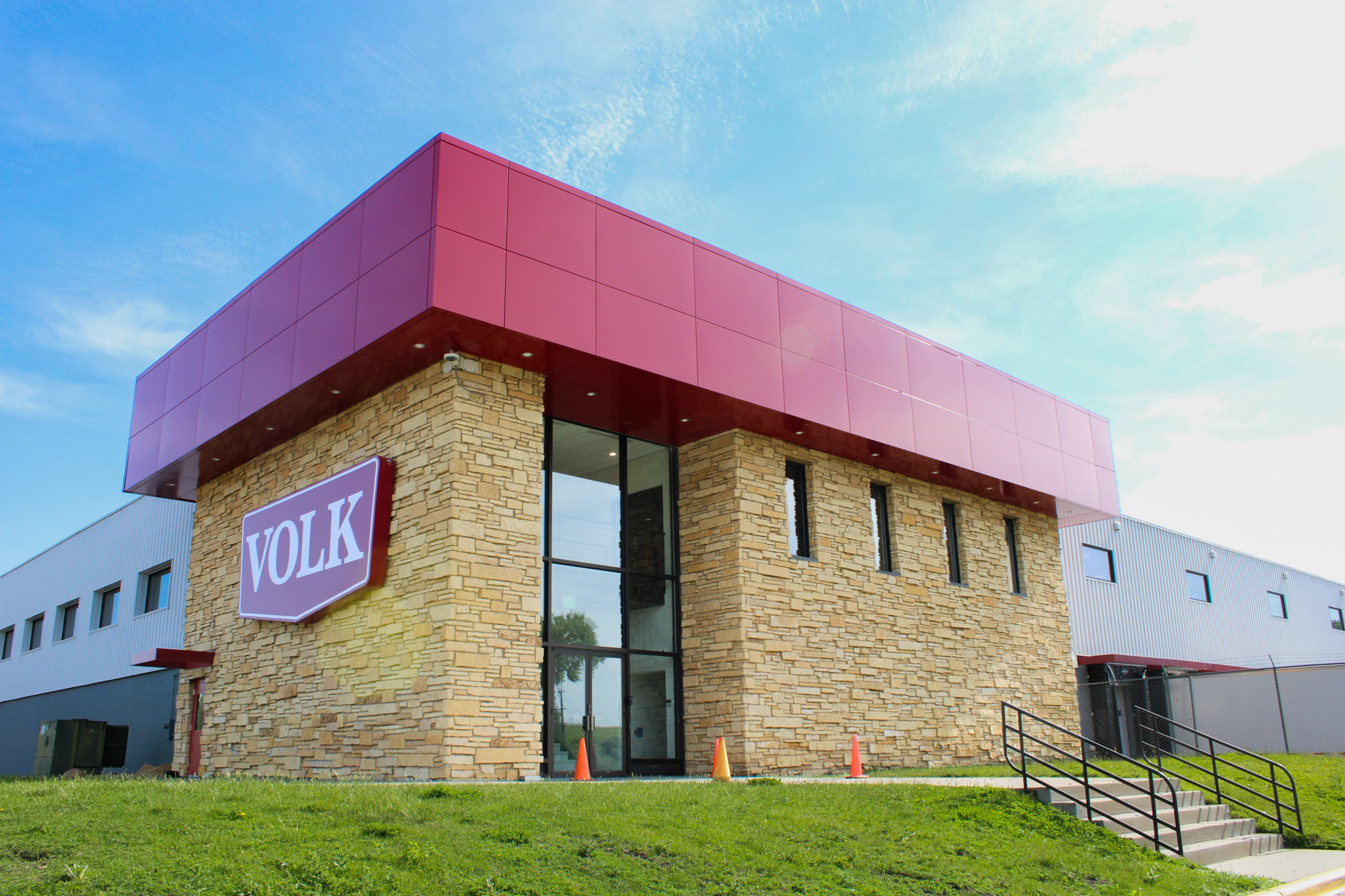 office building featuring red ACM panels